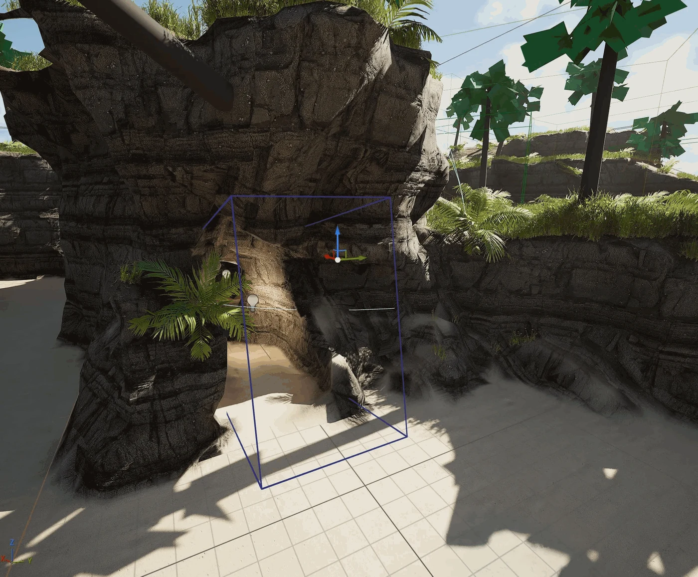 A voxel volume selected in the editor, its box outline placed in a rock where the cave will be carved